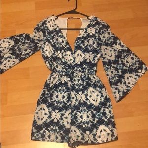 Cute low cut romper with open back